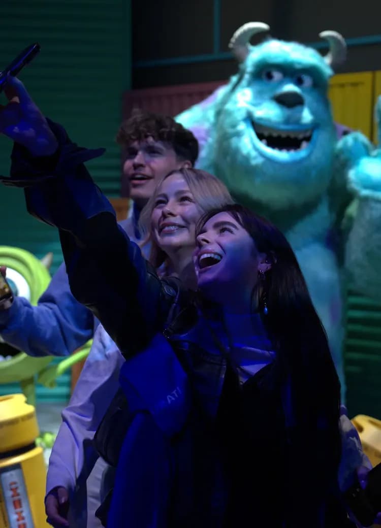 People with Sully from Monsters Inc Room